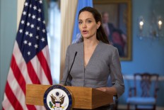 Angelina Jolie takes on travel ban in New York Times op-ed 