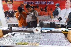Police raid suspected drug factory in South Jakarta apartment
