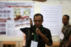 Unregistered voters must show family cards to vote