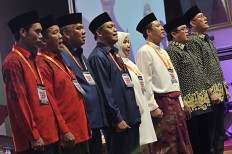 Officials scramble to clear campaign signs in Jambi