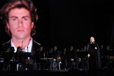 Adele starts over during George Michael tribute at Grammys 