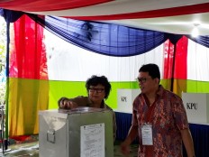 Agus casts vote with wife in Kebayoran Baru