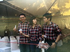 Ahok's son exercises right to vote for first time