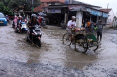 Bogor to demolish bridge deemed to cause flooding