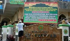 Police, election supervisor partner to investigate hate banners 