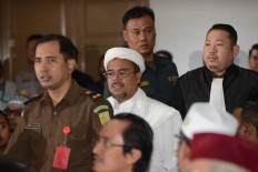 FPI head urges judges to detain Ahok 