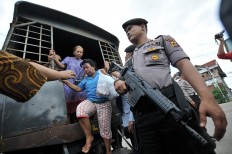 77 recaptured inmates redistributed after 'accidental' escape         