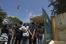 One N. Korean freed, another sought in nerve-agent killing 