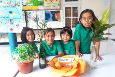 Cheers: Students from Sekolah Nusa Alam pose together during Science Week at their school.