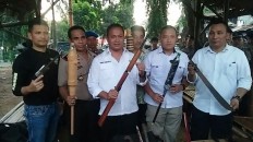 Sword, iron whip, confiscated from youngsters in Depok