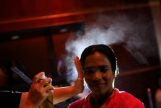 Acid victims redefine beauty in Bangladesh fashion show