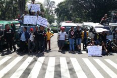 Quiet streets in Bandung as drivers stage strike