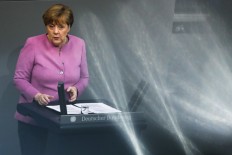 Merkel condemns 'disgusting' Virginia far-right violence