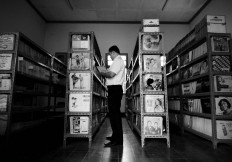A staff members checks on records shelved in a storage room at Lokananta. JP/Ganug Nugroho Adi