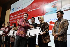 Literacy Award presented to 19 USAID-partner regencies, municipalities