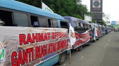 Bekasi public minivan drivers protest route revocation 