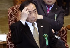 Abe's wife accused of giving envelope of cash in Japan scandal