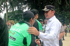 Ride-sharing app managements urged to solve Bogor clash