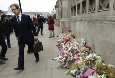 UK police give details of London attacker, make more arrests 