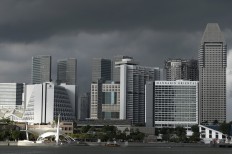 Storm clouds looming over the Marina Bay area. 
