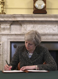 PM May vows Brexit deal for all in UK, including EU nationals