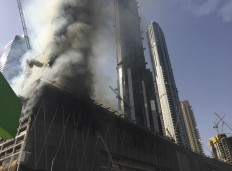 Fire hits Dubai high-rise complex near world's tallest tower