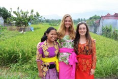 Samara (center), Tyas (left) and Freya (a supporter of the library project) out at the site.