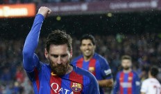 Barcelona wins after Messi goals, Real Madrid stays top