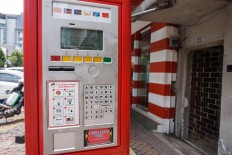 Jakarta goes back to manual parking system