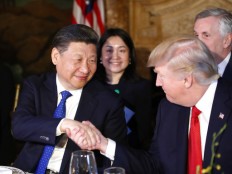 Trump, Xi meet again - in shadow of missile strikes on Syria 