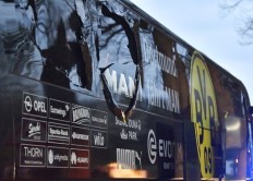 Germany: Pregame blasts rock soccer team bus; player injured 