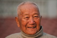 At 85, Nepali aims to regain title of oldest Everest climber 