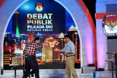 Anies meets Ahok at City Hall after victory to ensure smooth transition