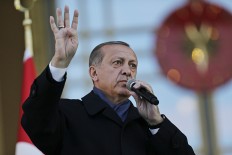 Turkey's president Erdogan fulfils ambition, but at a cost
