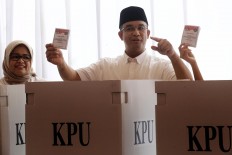 Jakarta election proceeds smoothly, peacefully