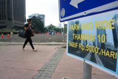 Park and ride spots in satellite cities to keep cars out of Jakarta