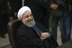 Iran says US violating nuclear deal with sanctions