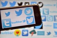 Twitter begins enforcing rules on 'hateful, abusive' content