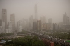 Dust storm blows across north China, flights cancelled