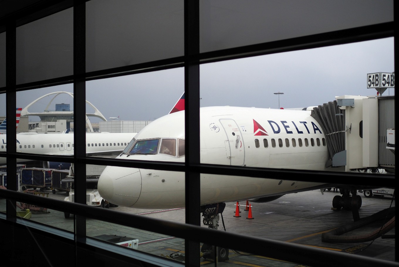 A passengers waits for a Delta Airlines flight in Terminal 5 at Los Angeles International Airport, May 4, 2017 in Los Angeles, California.