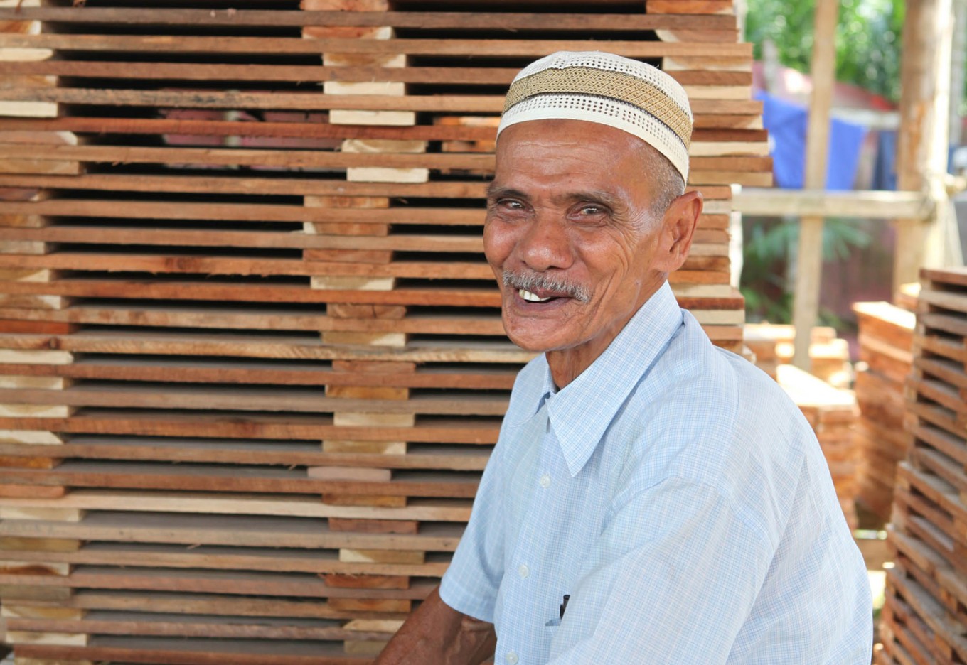 Zamhur poses in his workshop.