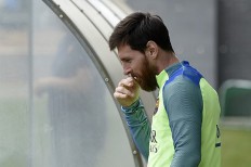 Messi extends Barcelona contract until 2021