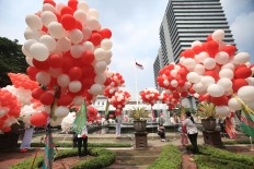 Ahok supporters to bring 8,000 roses on Tuesday's hearing