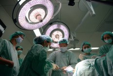 In an Asia first, robots aid in Thai brain surgery