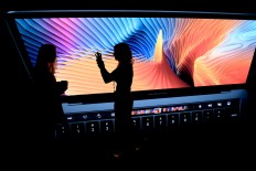 Apple plans laptop upgrades to take on Microsoft