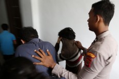 Activists condemn sentence of caning for gay couple in Aceh