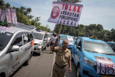 Police to investigate intimidation against app-based transportation operators in Batam