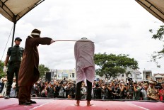 Hundreds caned under sharia in Aceh