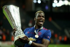 Juventus celebrate return of 'champion' Pogba