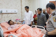 Police name three suspects in Kampung Melayu bombings